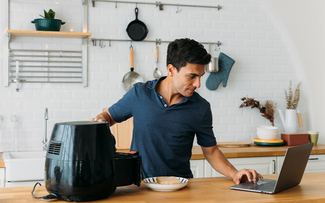 man cooking at home
